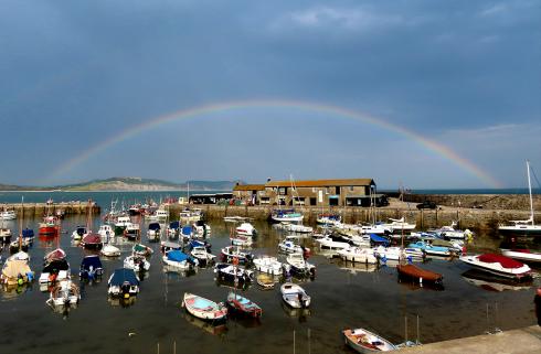 Rainbow over Lyme Regis harbour